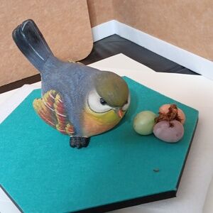 Colorful Bird Figurine with Eggs